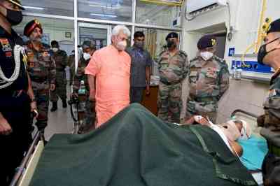 J&K LG visits hospital, inquires about health of injured civilian