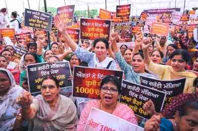 Protest against AAP govt's failure in Punjab to provide Rs 1,000 per month to women