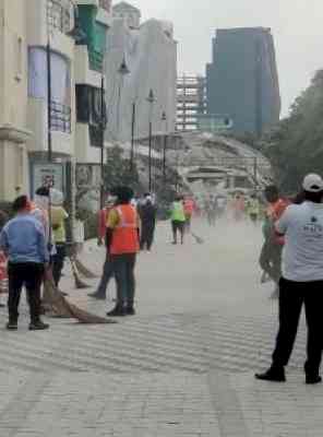 Twin tower demolition: Cleaning up begins, walls, windows damaged in adjacent society