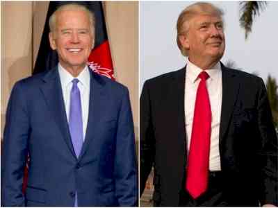 Biden, Trump not on ballot, but their long shadows loom over candidates