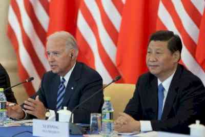 At meeting with Xi, Biden calls for two countries to work together, raises Taiwan, Xinjiang and Hong Kong (Lead)