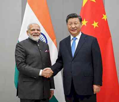 PM Modi shakes hands, exchanges pleasantries with Chinese President Xi in Bali