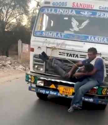 Man accused of stealing wheat bags tied to moving truck's bonnet in Punjab