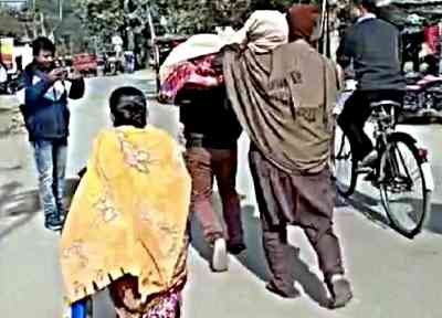 Man carrying mother's body on shoulder in Bengal's Jalpaiguri shocks people