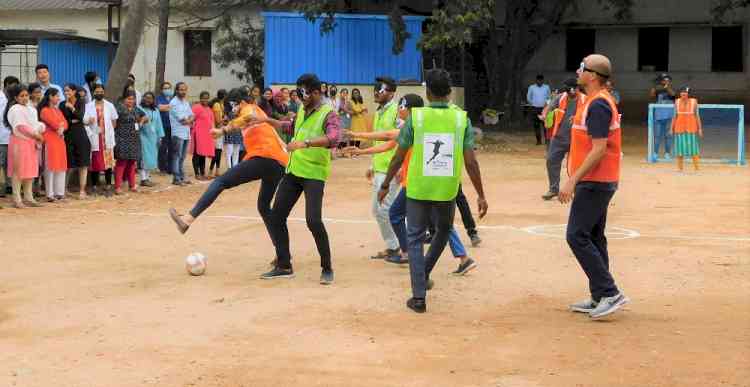 Doctors & Staff from Sankara Eye Hospital blindfold themselves with blind footballers from Equibeing Foundation for eye cancer awareness