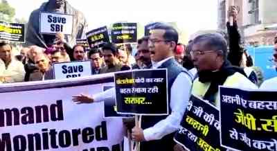 Oppn protests in Parliament premises demanding JPC probe into Adani issue
