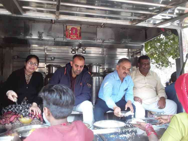 Bhandara served to hundreds of underprivileged people 