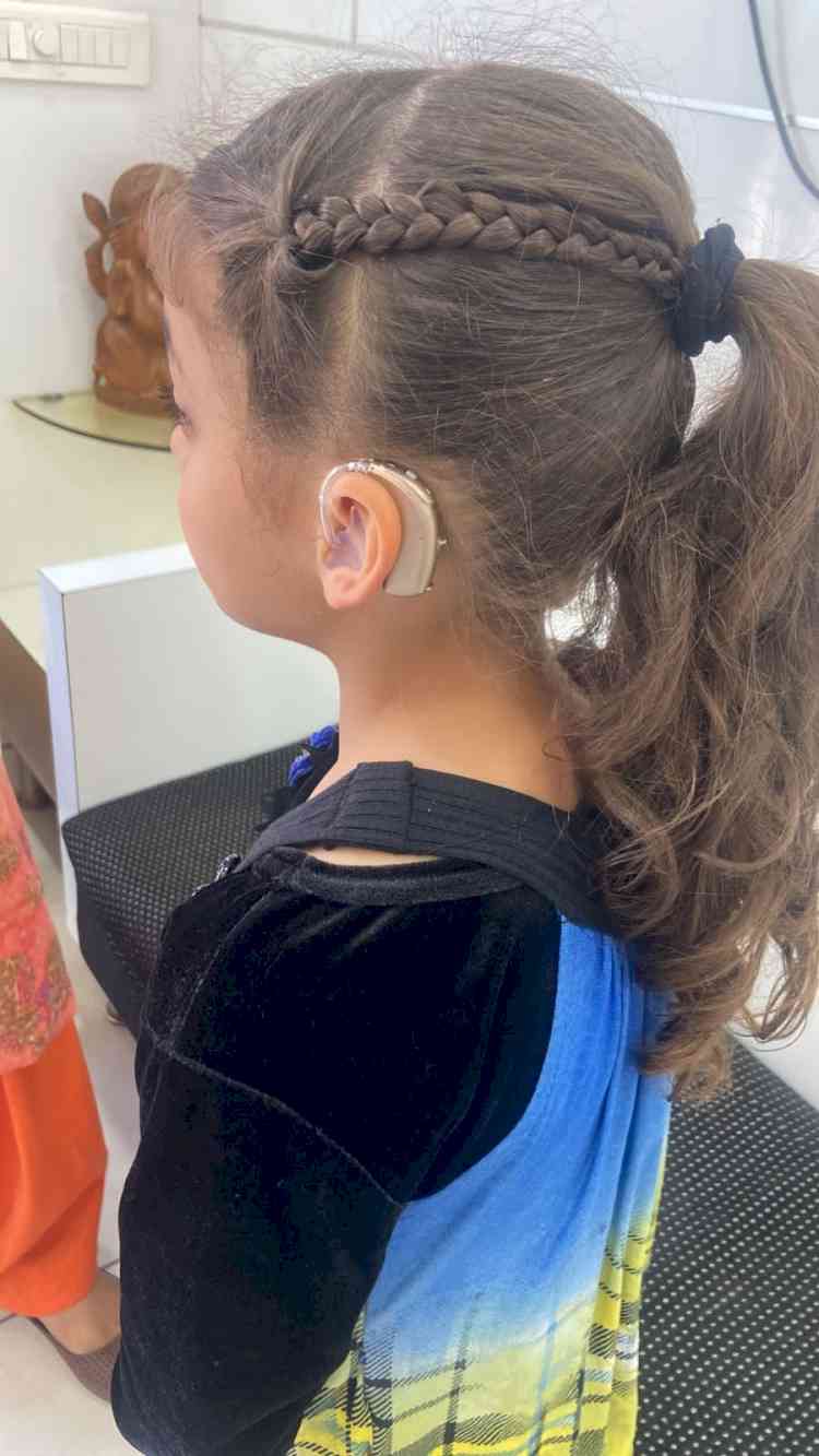 Red Cross Society gives hearing aid to needy 9-year-old girl