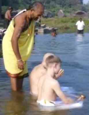 Ashes of American archaeologist immersed in Tungabhadra river at Hampi