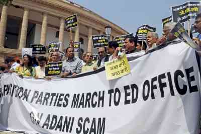Oppn stages protest march from Parliament to ED office, seek probe in Adani issue
