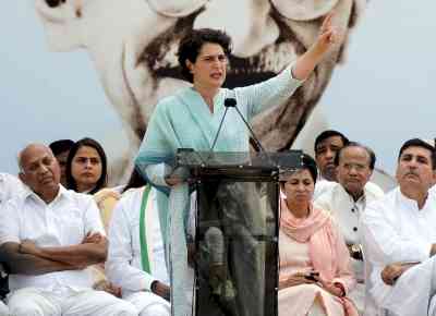 PM hiding behind power: Priyanka