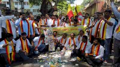Kannada activists throw Amul products on street in protest