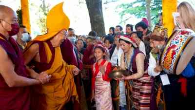 Dalai Lama apologises to boy, his family