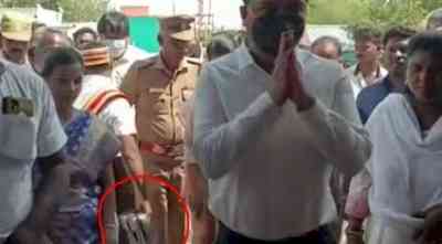 TN district collector in spot after video of assistant carrying his shoes goes viral