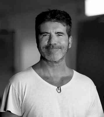 Simon Cowell quits smoking after puffing on 40 cigarettes a day