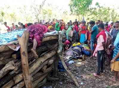 Dantewada Attack: Slain DRG jawan's grieving widow lies down on husband's pyre