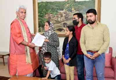 J&K L-G hands over appointment letter to widow of man killed by terrorists