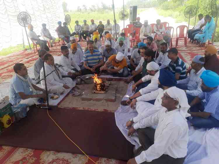 Members of Shaheed-E-Watan Youth Organisation along with other NGOs perform “Sarv Dharam” Prayers for construction of PGI Satellite Centre