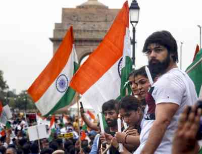 Protesting wrestlers hold candlelight march to India Gate