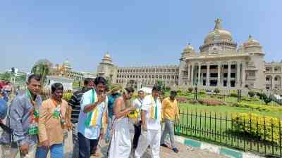 Congress workers purify Karnataka Vidhana Soudha with cow urine