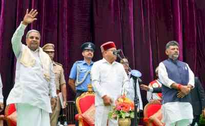 24 ministers take oath in K'taka, CM Siddaramaiah says allotment of portfolios in 24 hours