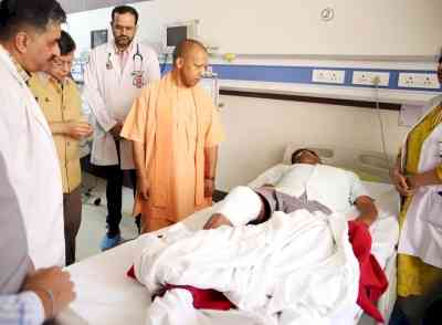 Yogi visits hospital to see child injured in courtroom shootout