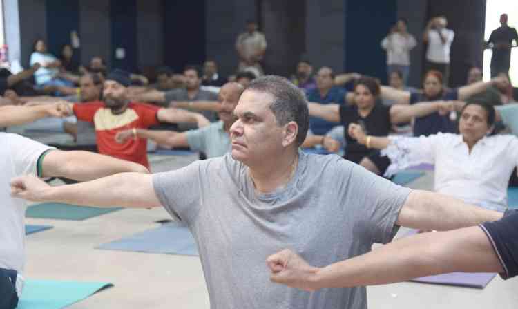 MP Arora performs yoga and praises “CM Di Yogshala”