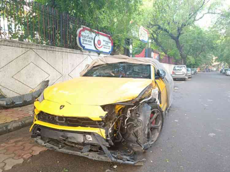 Lamborghini hits auto, 2 injured