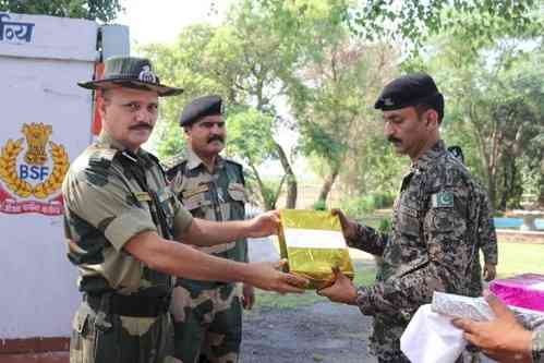 Sweets exchanged by BSF, Pakistan Rangers on Jammu border on Eid