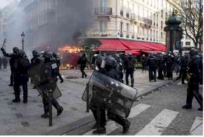 Protesters clash with riot officers at march for killed teen in France