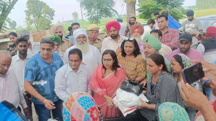 Flood-hit villages- DC distributes 500 dry ration kits, sanitary pads and tarpaulins 