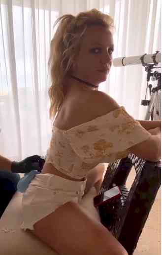 Britney Spears shares video of cryptic new tattoo after split from Sam Asghari