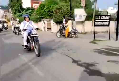 Haryana CM rides motorcycle to reach airport