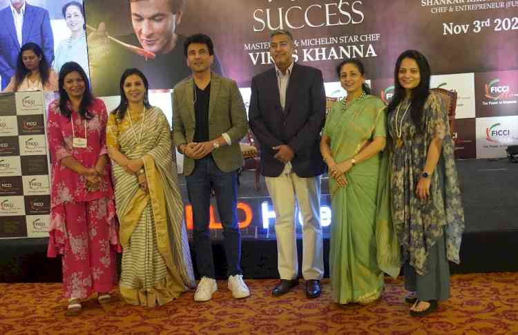Celebrity Chef Vikas Khanna interacts with FLO members