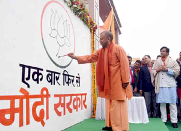Yogi launches wall writing campaign with ‘Is baar BJP char sau paar’