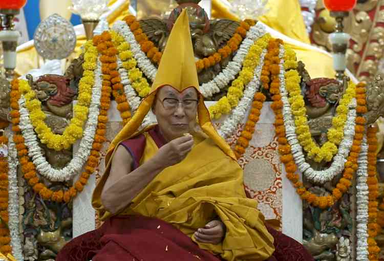 Dalai Lama vows to serve humanity for over a century during long life prayer ceremony