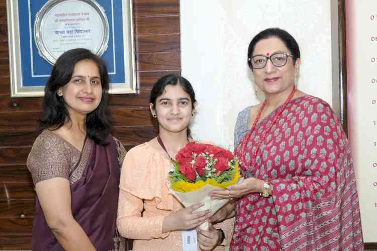 Principal Prof. Dr. Atima Sharma Dwivedi felicitate Navneet Kaur on successfully qualifying IIT JAM Examination