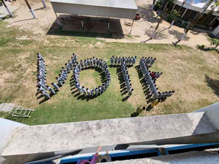 Students in different schools form human chains to spread awareness among voters