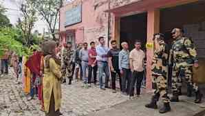 Kathua DC-cum-returning officer waits in queue to cast vote in J&K's Kathua-Udhampur constituency