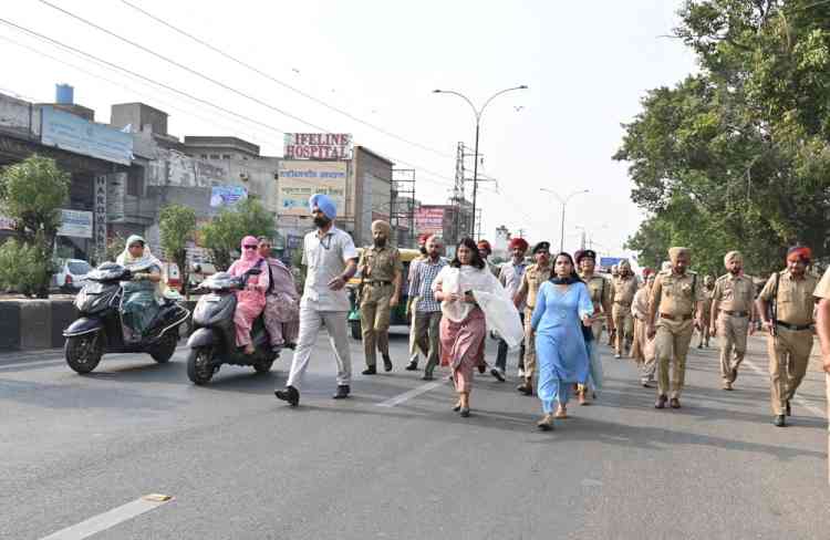 DEO Sakshi Sawhney leads flag march of  Punjab police
