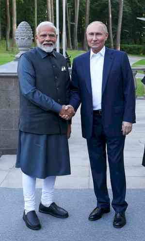 President Putin hosts PM Modi at his official residence 