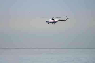 Coast Guard helicopter crashes in sea, search on for missing pilot 