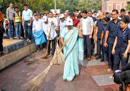 With a broom in hand, Delhi CM Gupta cleans Hanuman Mandir complex