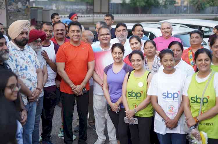 MP Arora Joins Morning Walk at PAU, Bypoll Campaign