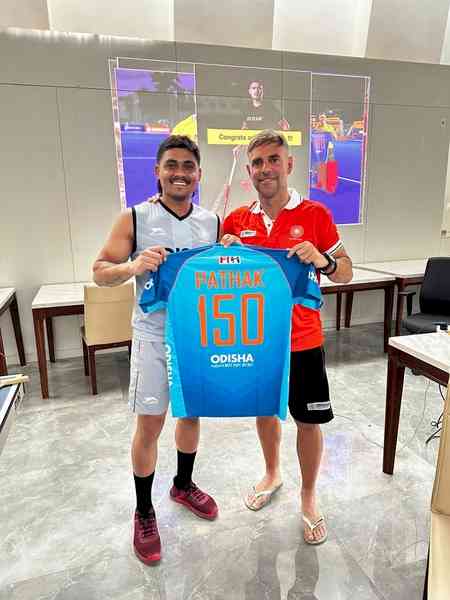 Hockey India congratulates Krishan Pathak on completing 150 international games
