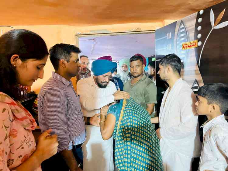 MLA Bhola Grewal and DC Jain visit grieving family in New Puneet Nagar where child died after roof collapsed
