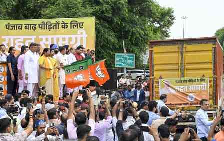 Delhi CM Rekha Gupta flags off 52 trucks of relief material for Punjab flood victims