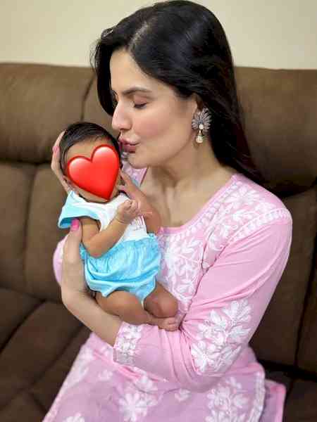 Zareen Khan pampers niece with a foot massage as she turns 4 months old