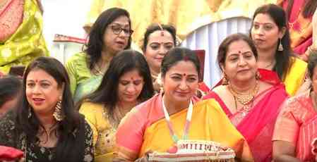 Delhi CM Rekha Gupta participates in Karwa Chauth rituals with several women at her residence