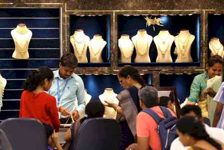 Gold records first weekly loss after nine-week surge